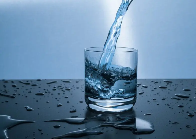 WATER BEING POURED IN A GLASS